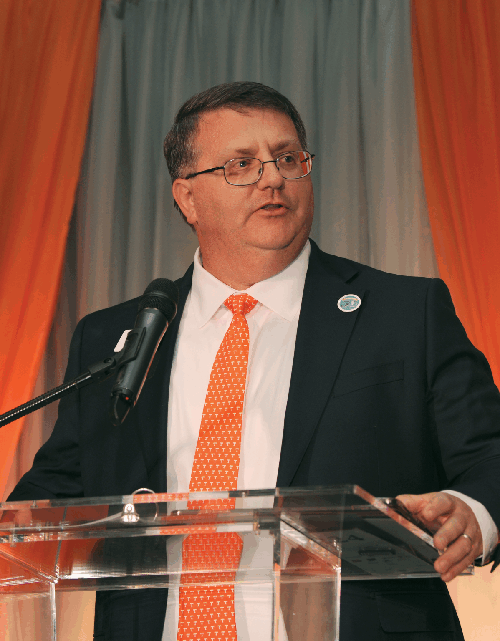 Dr. Plummer speaking in front of the crowd of the annual Ag Day.