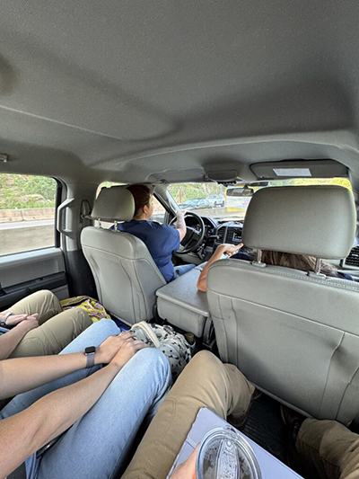 Conner Boley and students on the road to a vet farm call.
