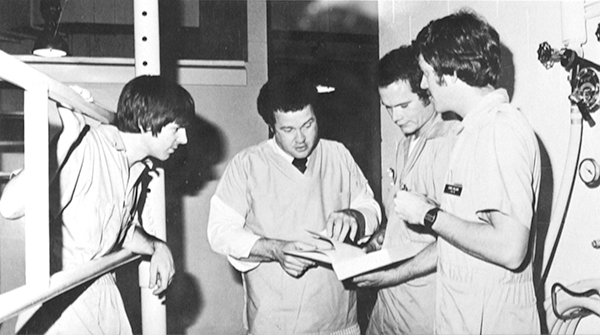 Dr. John Henton with students pictured in the first CVM yearbook in 1979.