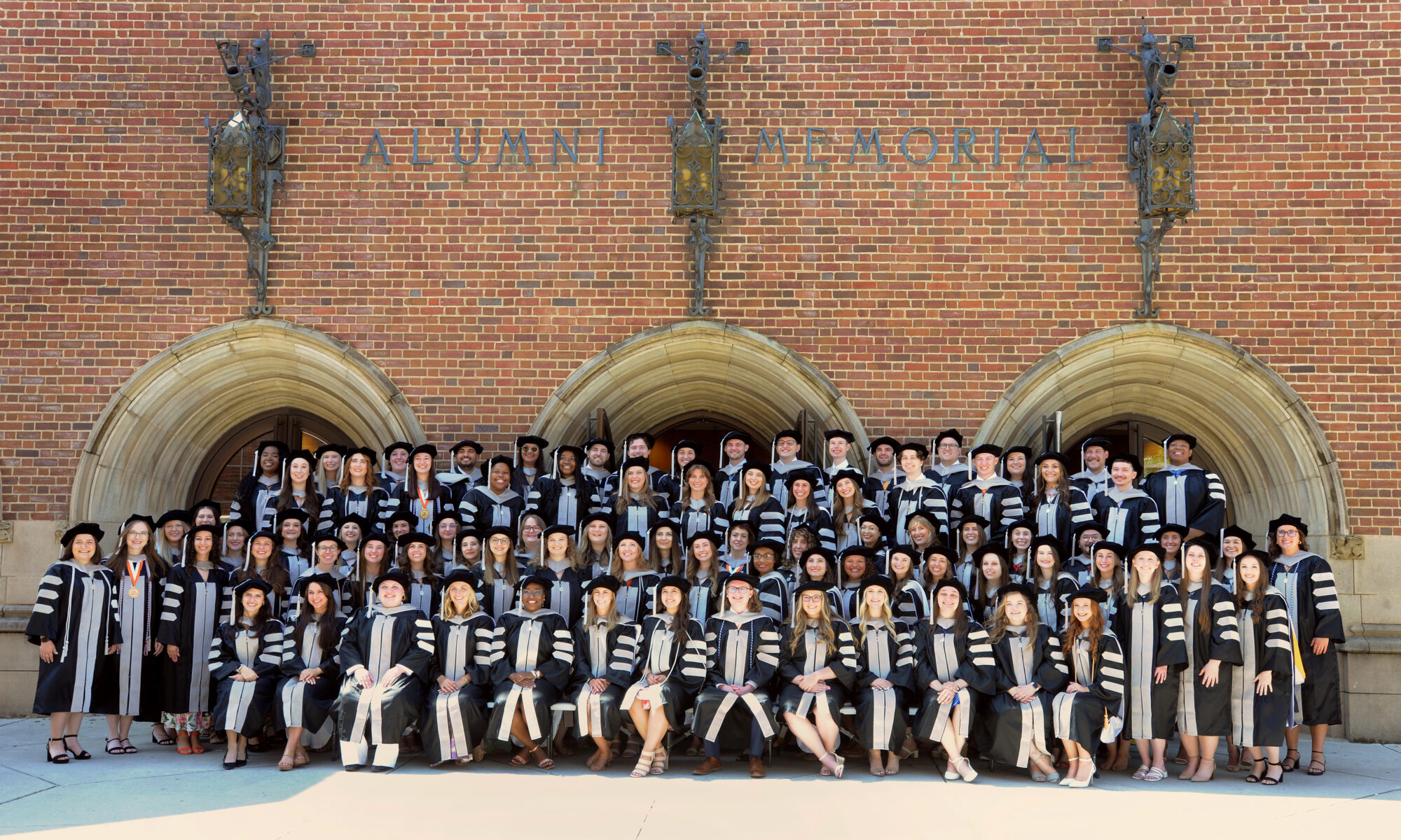 Picture of Class of 2025 in front of the Alumni Memorial Hall.