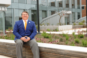 Dr Plummer sitting in the open area of the new ANR building.