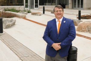 Dean Plummer in the courtyard outside of building ANR.