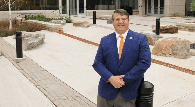 Dean Plummer in the courtyard outside of building ANR.