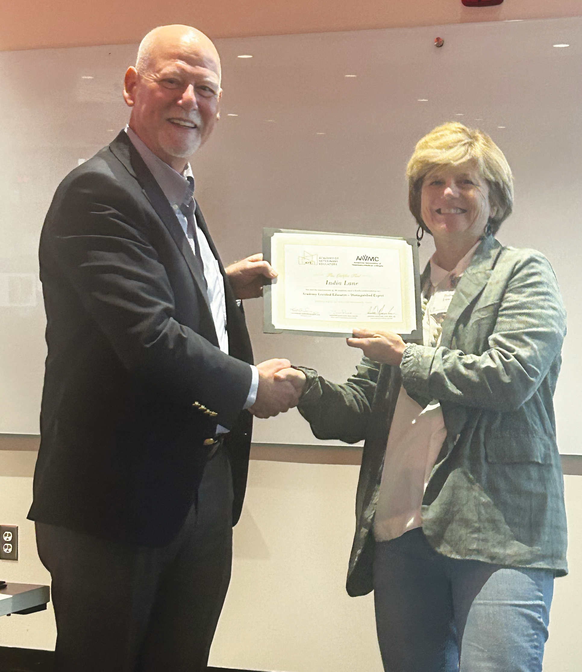 India Lane being named Founding Distinguished Experts for the International Academy of Veterinary Educators (AVE).