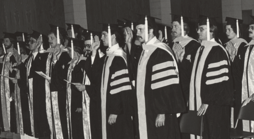 Graduates recite the veterinary oath at the college’s first commencement ceremony in 1979.