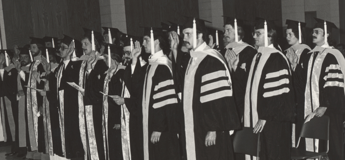 Graduates recite the veterinary oath at the college’s first commencement ceremony in 1979.