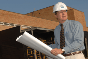Dr. Jim Thompson looks over blueprints during construction of the John and Ann Tickle Small Animal Hospital expansion.