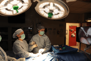 Veterinarians doing surgery in a surgery suite.