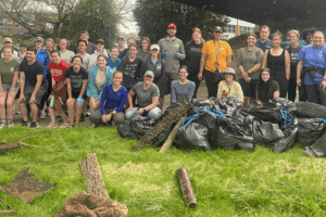 Students volunteer to pick up trash along Third Creek.