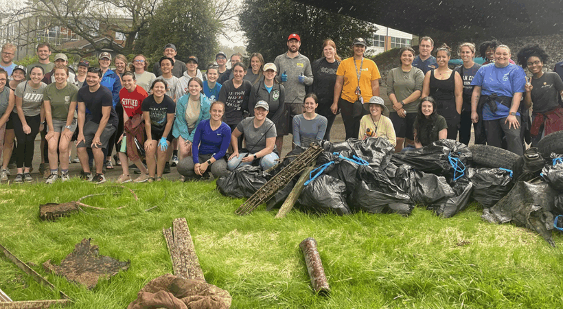 Students volunteer to pick up trash along Third Creek.