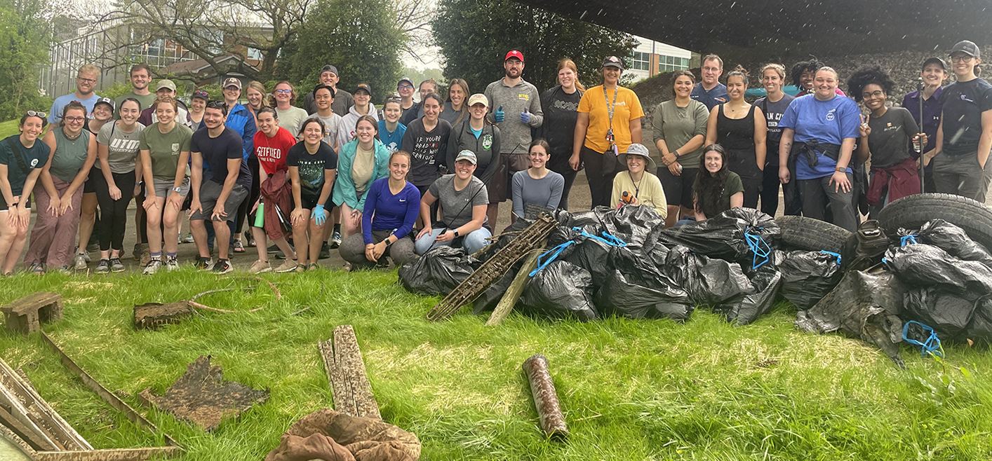 Students volunteer to pick up trash along Third Creek.